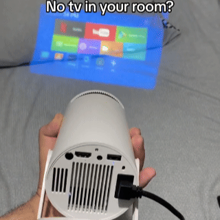 Mini HD Portable Projector – WiFi, Bluetooth & Speakers Evolved Chargers